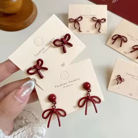 ARETES TUERCA LAZO ROJO ELEGANTES